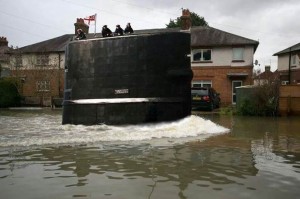 HMS Tireless breaks free from its moorings in Bovingdon Docks and heads up Hyde Meadows in April 1977.